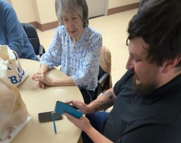 A client enjoying newly set up technology